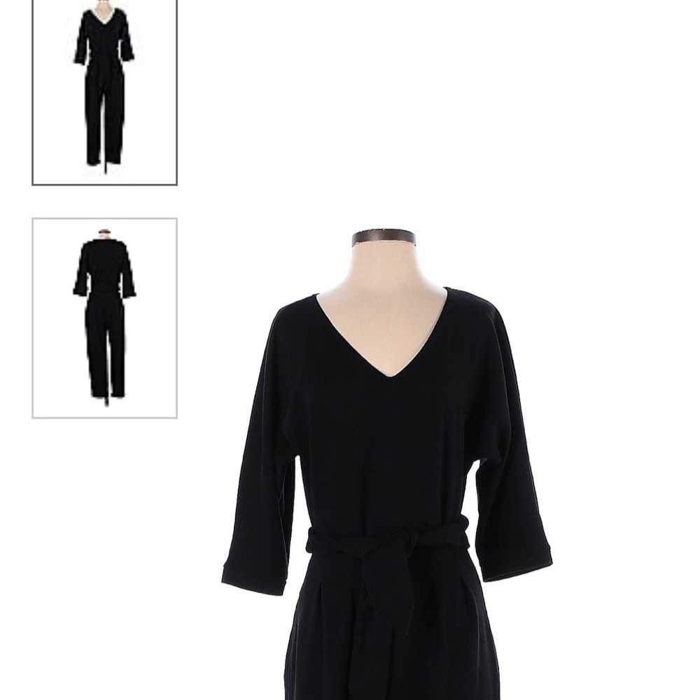 Anthropologie jumpsuit with Pockets!! Heavier fabric, v-neck, relaxed fit.